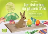 Der Osterhas im grünen Gras.